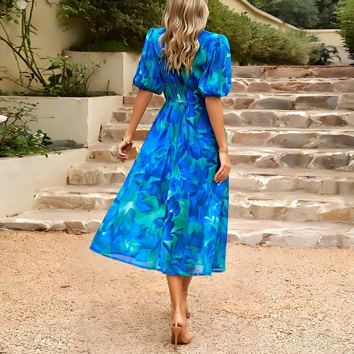 CALYRA – V-NECK MIDI DRESS WITH BOLD PRINT & BRIGHT COLORS