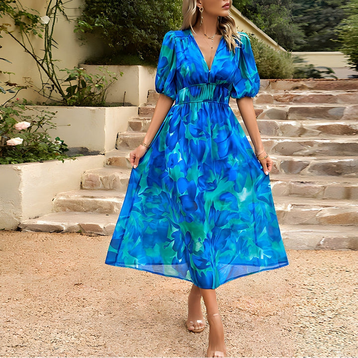 CALYRA – V-NECK MIDI DRESS WITH BOLD PRINT & BRIGHT COLORS